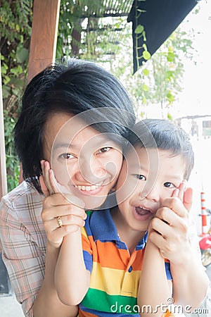 Cute asian boy and his aunt Stock Photo