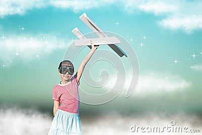 Cute asian girl playing toy plane as pilot imagination to the future at flower grass field vintage filtered. Stock Photo