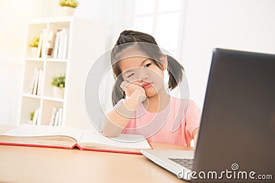 Cute asian little daughter girl looking confused Stock Photo