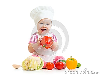 Cute baby chef with healthy food Stock Photo