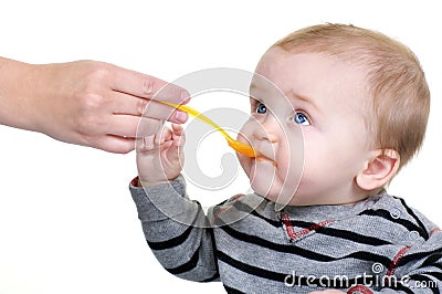 Cute Baby Eating Lunch Stock Photo