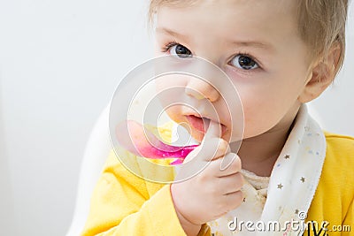 Cute baby eating Stock Photo