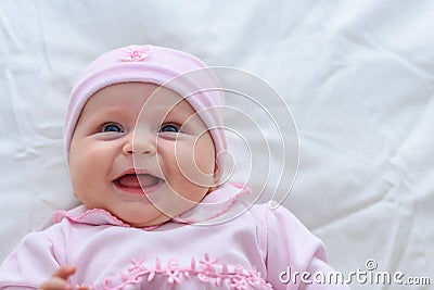 Cute baby girl portrait. Sweet little girl All dressed in Pink cloth Stock Photo
