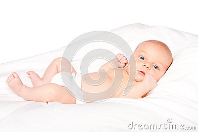 Cute baby infant laying on pillow Stock Photo