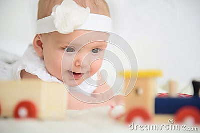 Cute baby lying on bed Stock Photo