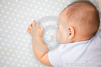 Cute Baby Sleeping laying prone Stock Photo