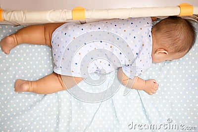 Cute Baby Sleeping laying prone Stock Photo