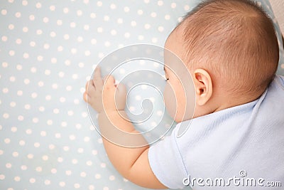 Cute Baby Sleeping laying prone Stock Photo