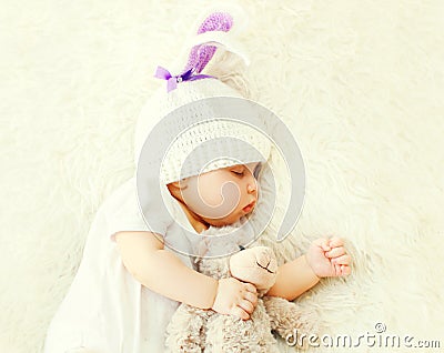 Cute baby sleeping on white bed at home close up Stock Photo