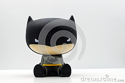 Cute Batman piggy bank isolated on white background. Batman from DC comics Editorial Stock Photo