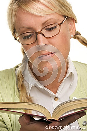 Cute Blonde Plays With Ponytails & Reads a Book Stock Photo