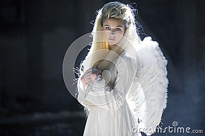 Cute blondie as an angel Stock Photo