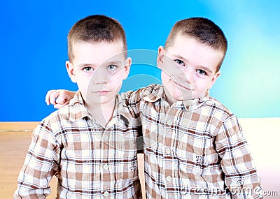 Cute blue-eyed children posing Stock Photo