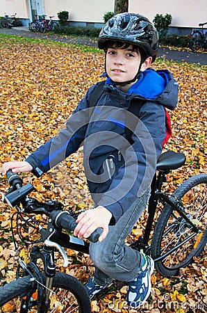 Cute boy on bicycle Stock Photo