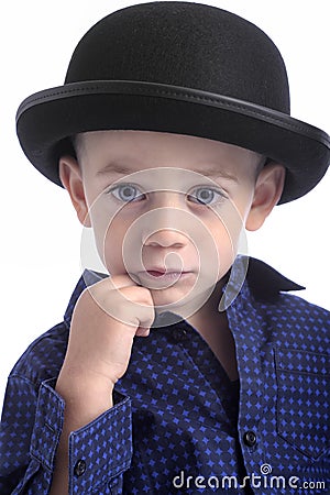 Cute boy with bowler hat Stock Photo