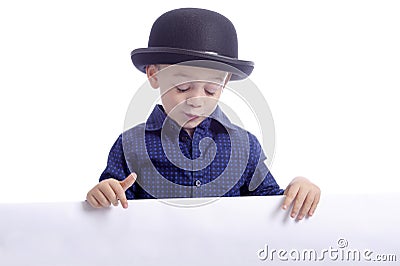 Cute boy with bowler hat and ad space Stock Photo