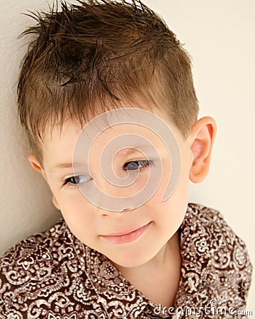 Cute boy happy content daydreaming child Stock Photo
