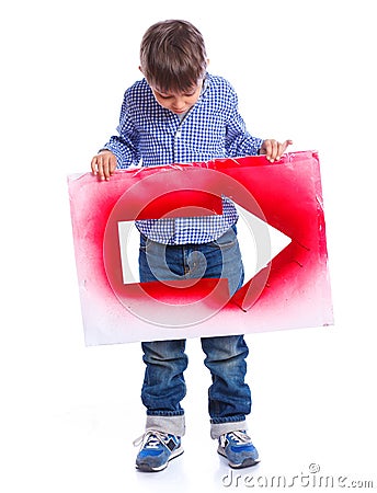 Cute boy holding red arrow Stock Photo