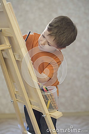 Cute Boy Painting On Canvas Stock Photo