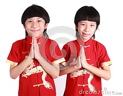 Cute boys wearing red Chinese suit Stock Photo