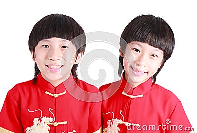 Cute boys wearing red Chinese suit Stock Photo