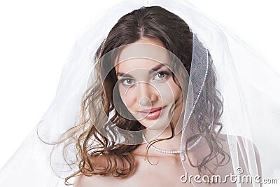 Cute bride under veil isolated on white Stock Photo