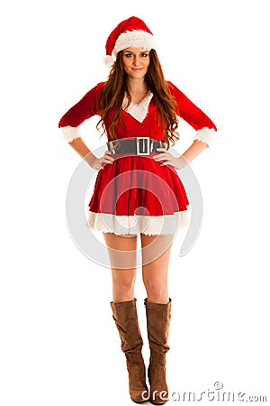 Cute brunete girl in santa claus dress with presents for christmas Stock Photo