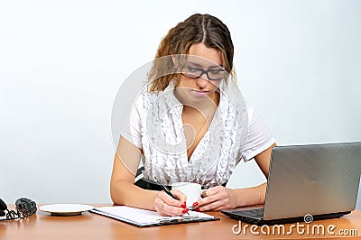 Cute businesswoman planning work Stock Photo