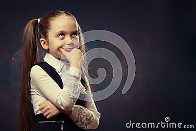 Cute Caucasian Elementary Schoolgirl Body Portrait. Color Tone Stock Photo