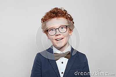 Cute child boy student on white background. Smart kid portrait Stock Photo