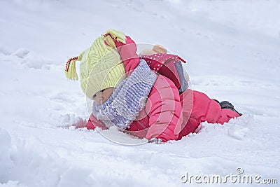 Cute child girl on snow. Winter outdoor activities Stock Photo