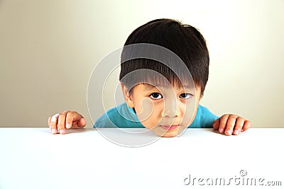 Cute child looking sad Stock Photo