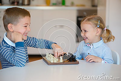 Cute children playing at home Stock Photo