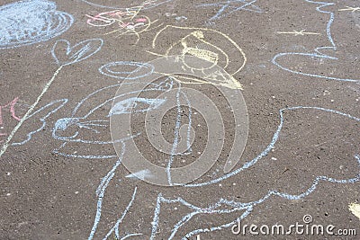 Children`s chalk drawings on ground Stock Photo