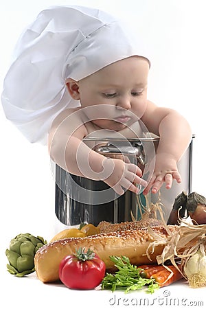 Cute Chubby Baby Chef in a Cooking Pot Looking Dow Stock Photo