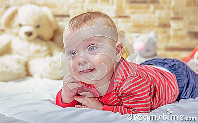 Cute chubby little baby with a happy smile Stock Photo