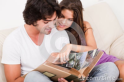 Cute couple looking photos Stock Photo