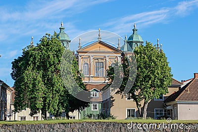 Cute and cozy houses of Scandinavian architecture on a street in the center of Kalmar Editorial Stock Photo