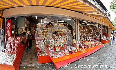 Cute and creative gifts, souvenir, toys, food found along the walking street of Nara Editorial Stock Photo