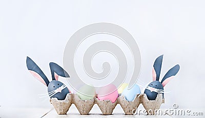 Cute creative photo with easter eggs, some eggs as the Easter Bunny Stock Photo