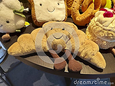 Croissant-shaped plush dolls Stock Photo