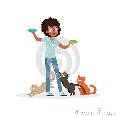 Cute curly-haired girl feeding homeless cats. Volunteer holding bowls with milk. Social help. Teen in glasses, blue t Vector Illustration