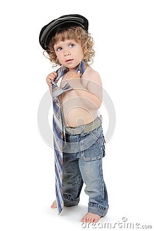 Cute curly little boy wearing tie and ca Stock Photo