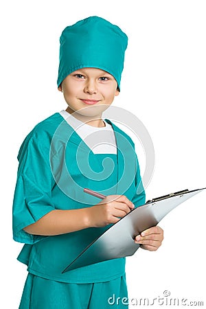 Cute doctor boy with medical clipboard isolated on Stock Photo