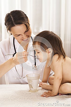 Cute doctor with little girl Stock Photo