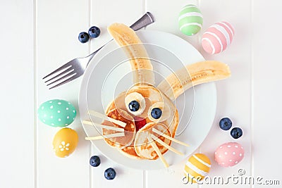 Easter Bunny pancake breakfast, flay lay against a white wood background Stock Photo