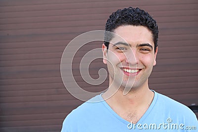 Cute ethnic man smiling with copy space Stock Photo