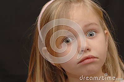 Cute, Exasperated Little Girl Stock Photo