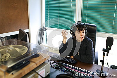 Work broadcaster and chat with interesting guests for recording Editorial Stock Photo