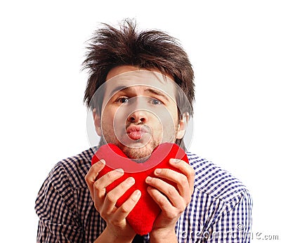 Cute funny young man with toy heart Stock Photo